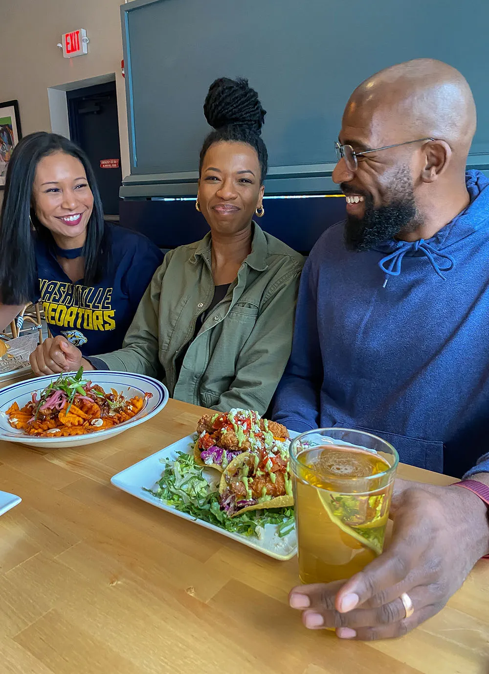 people laughing around a table